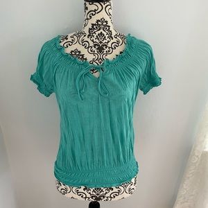 Super cute turquoise short sleeved top size medium by Belle du Jour